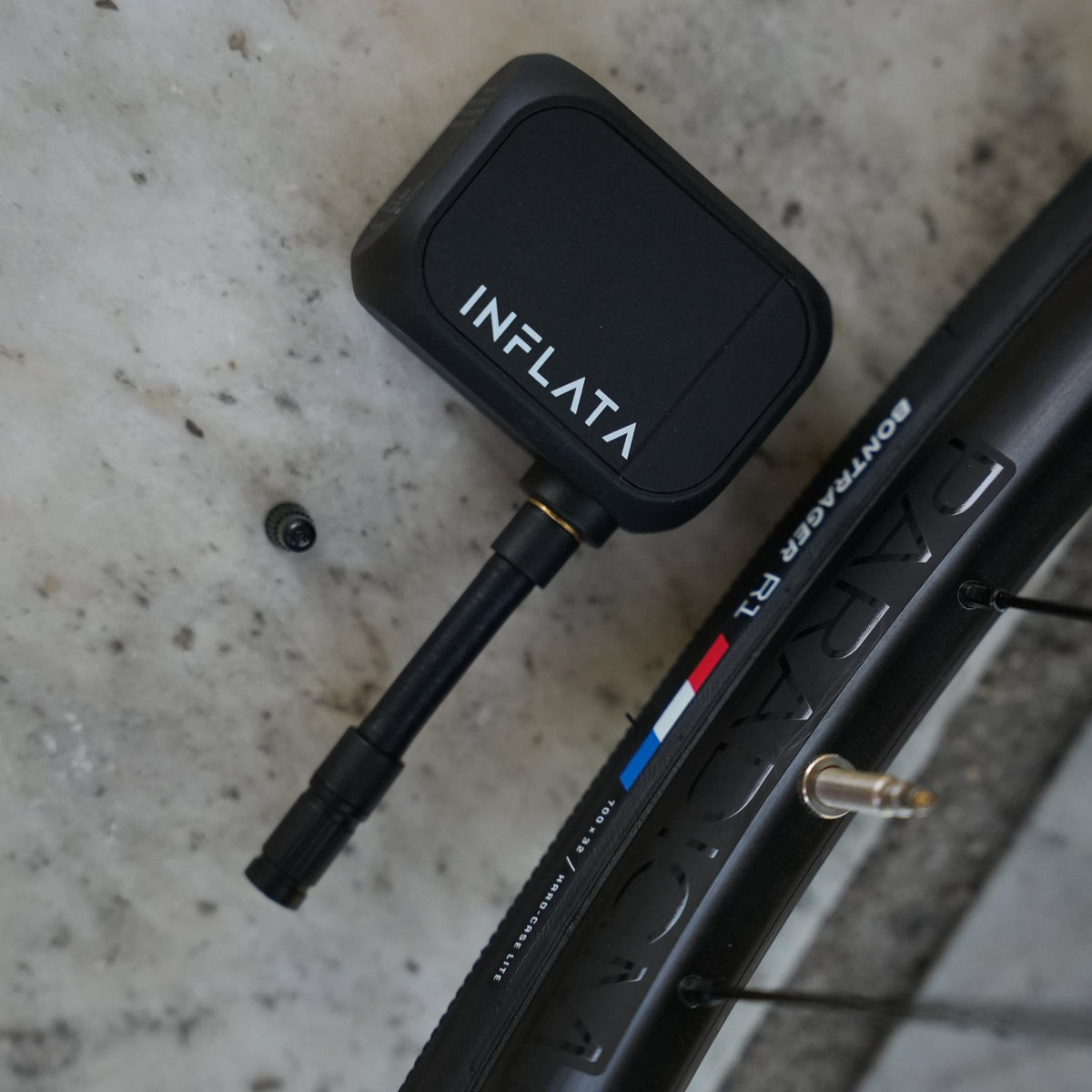 INFLATA Pro S attached to a road bike wheel